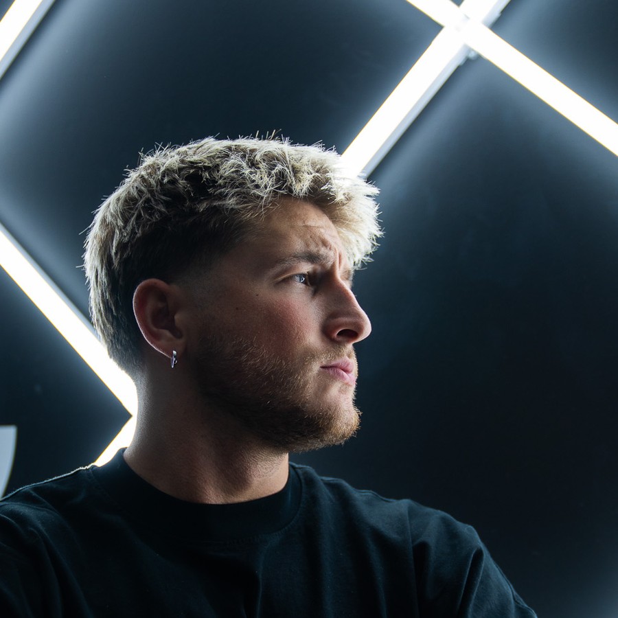 Mayson Brown, creator and marketing manager based in Scottsdale, Arizona, in profile wearing a dark hoodie.